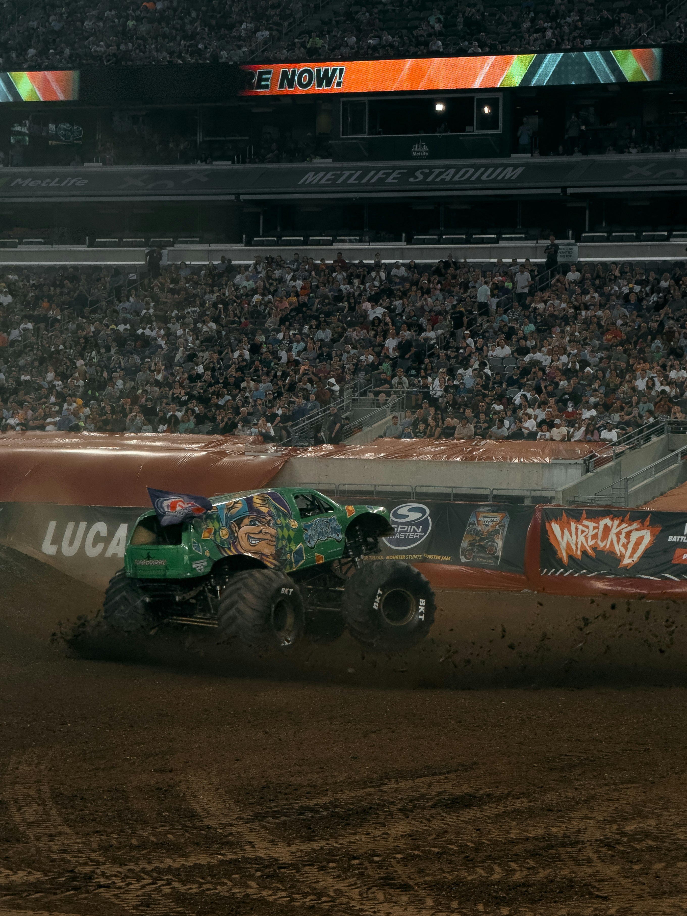 a monster truck that is in the dirt