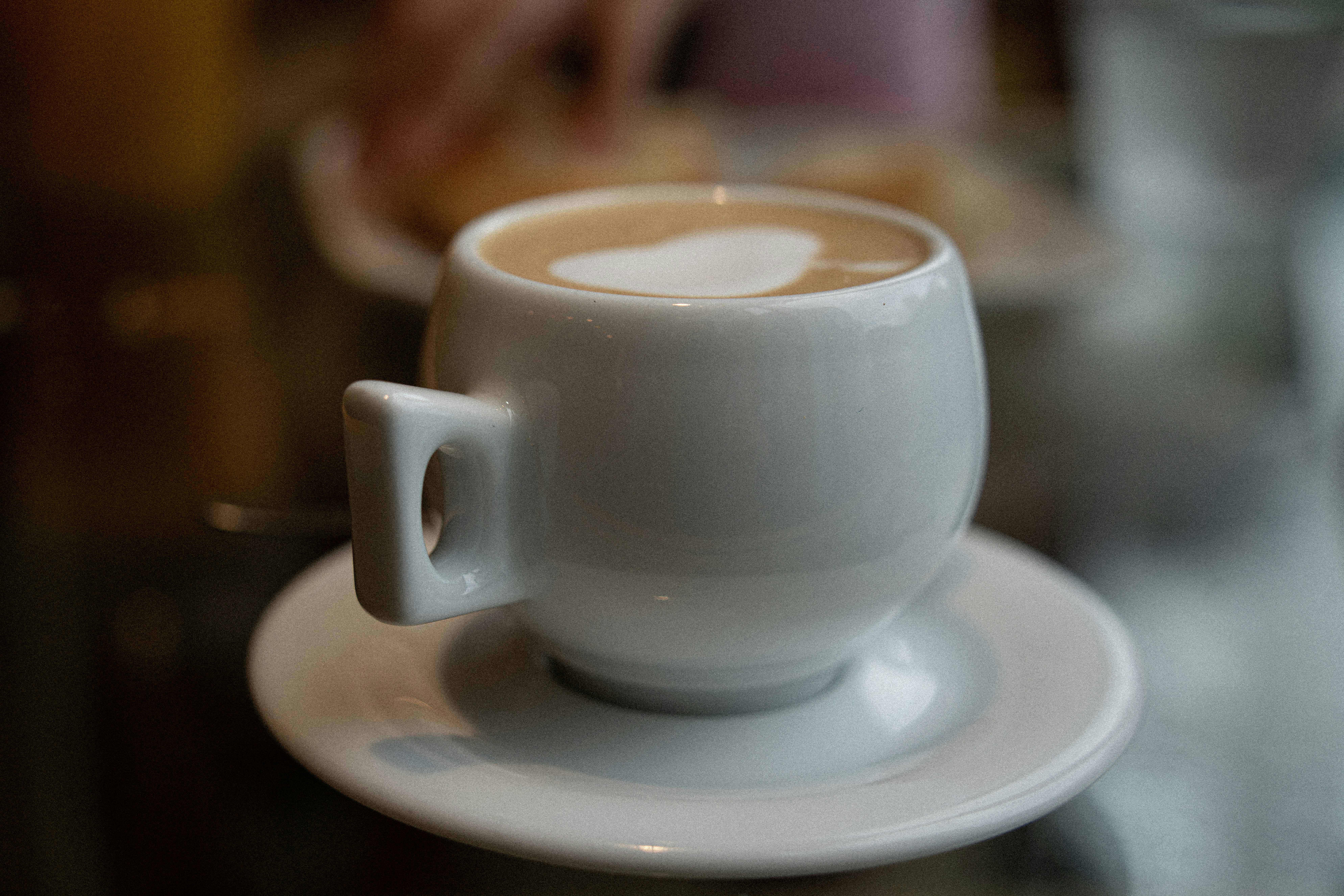 a cup of coffee sitting on top of a saucer