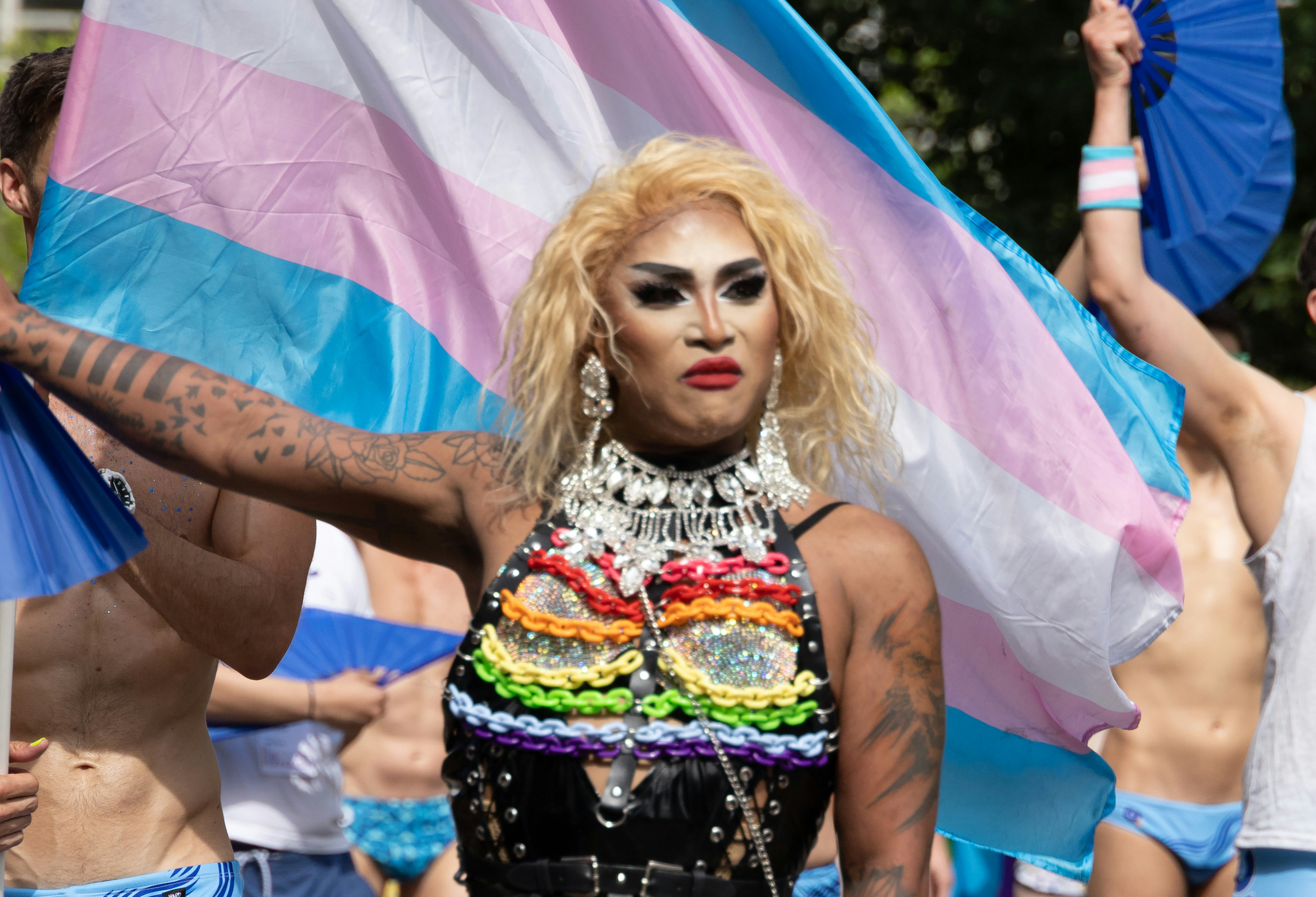 a group of people that are standing in the street