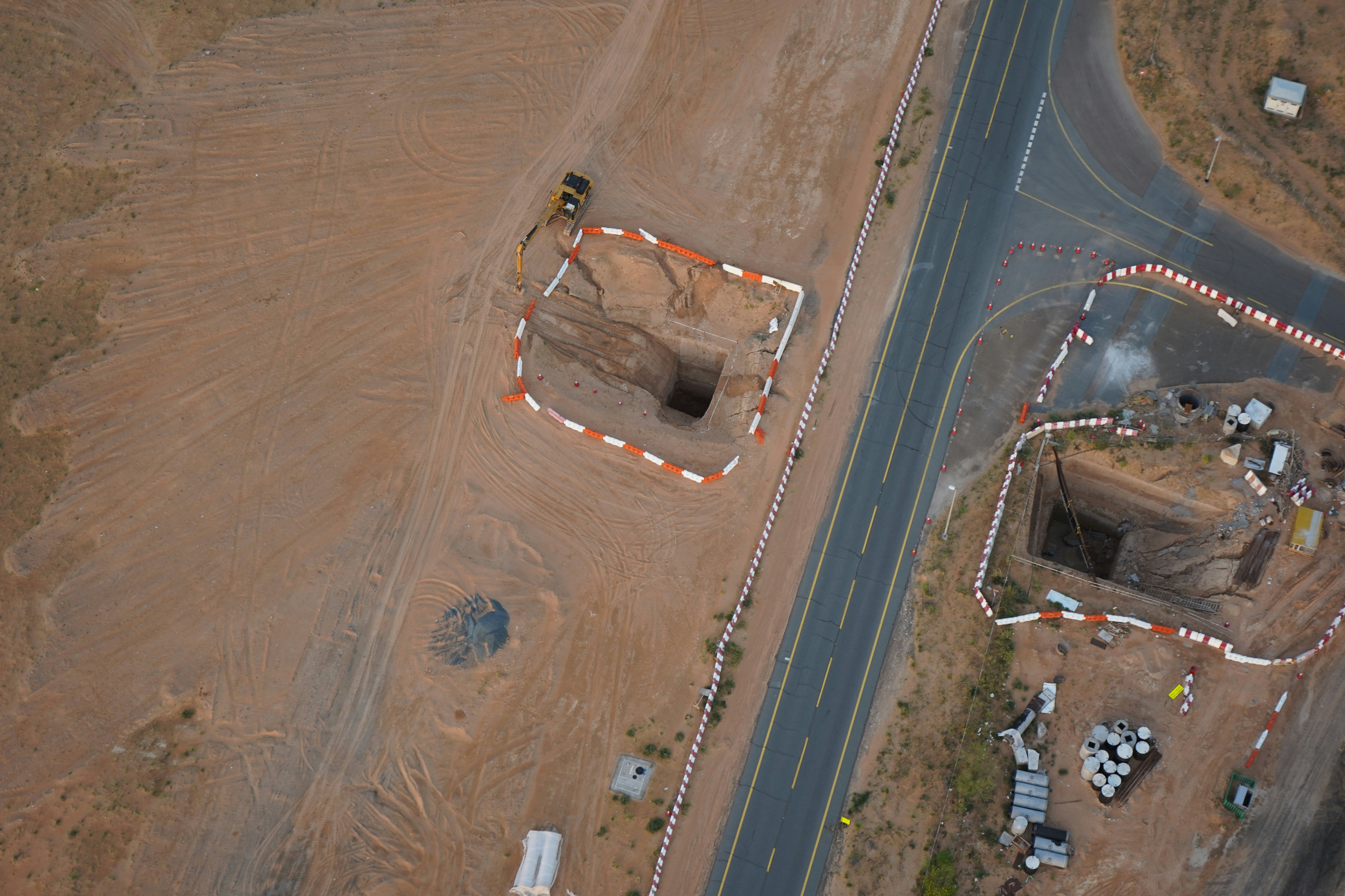 an aerial view of a construction site in the middle of nowhere