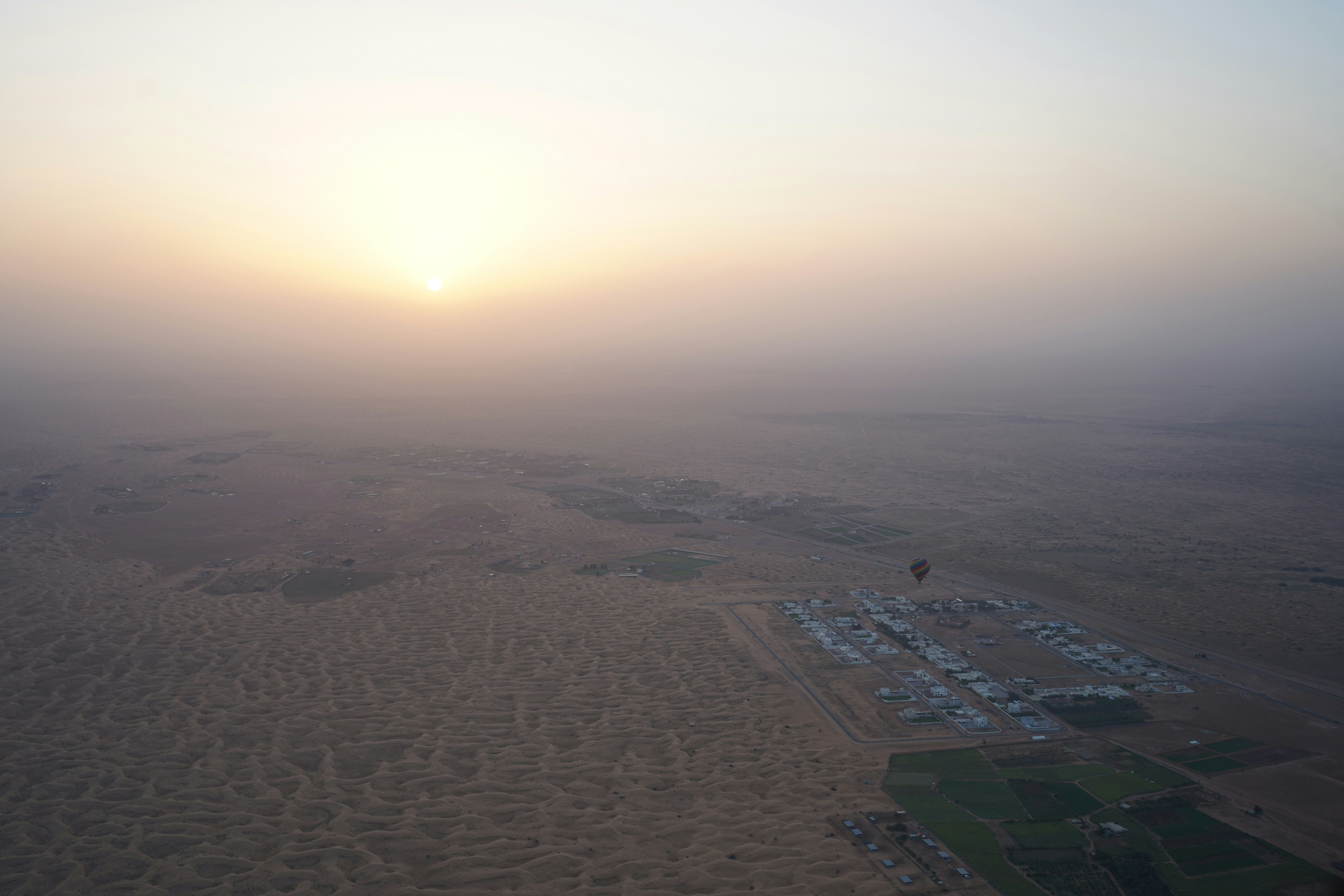 a hot air balloon flying in the sky