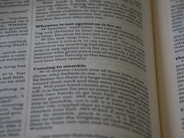 a close up of an open book with words on it
