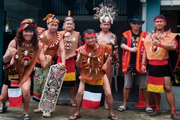 a group of men standing next to each other