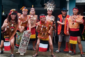 a group of men standing next to each other
