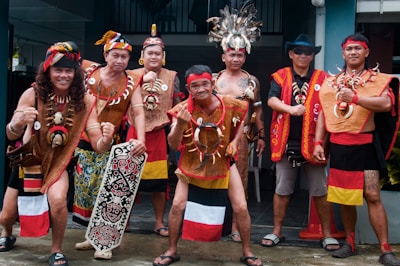 a group of men standing next to each other
