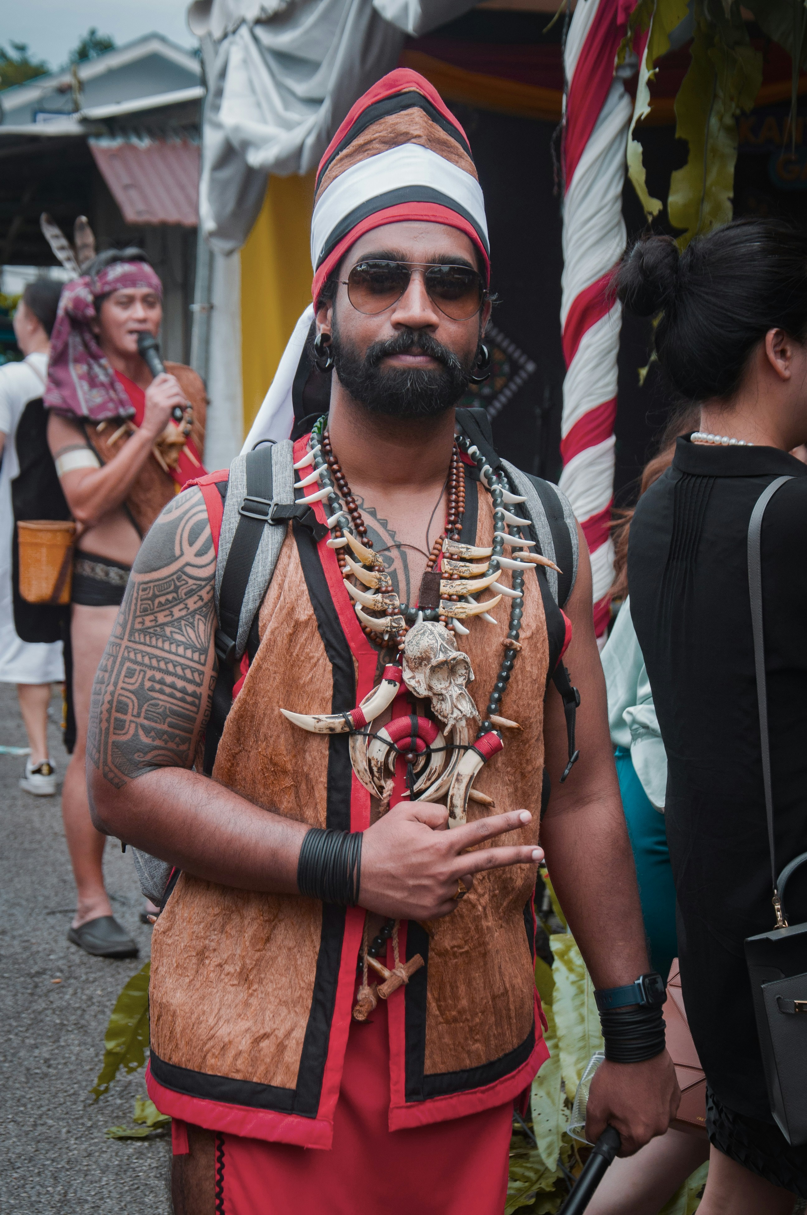 a man dressed in a costume and headdress