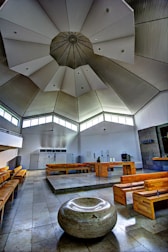 a large open room with benches and tables