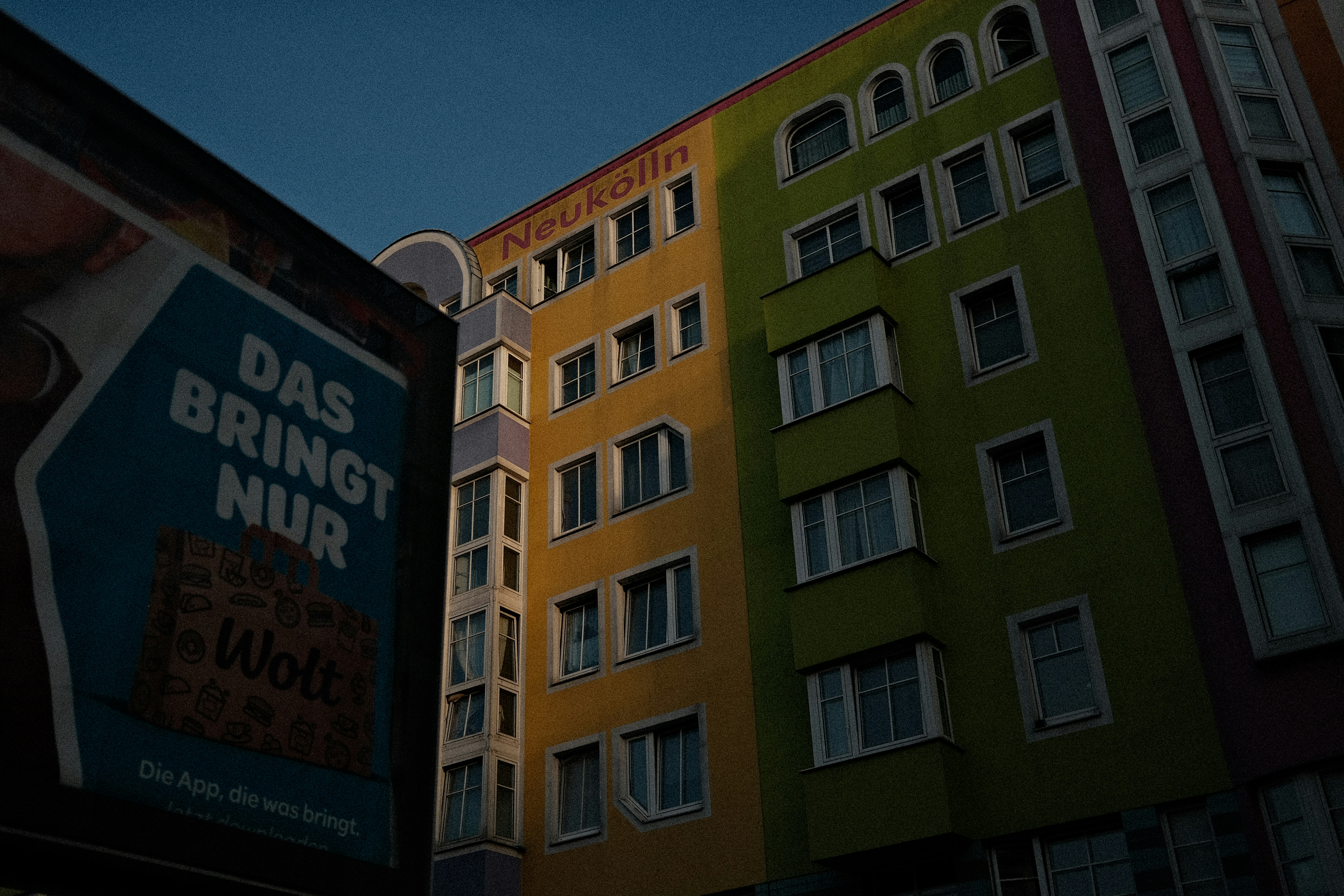 a building that has a sign on the side of it