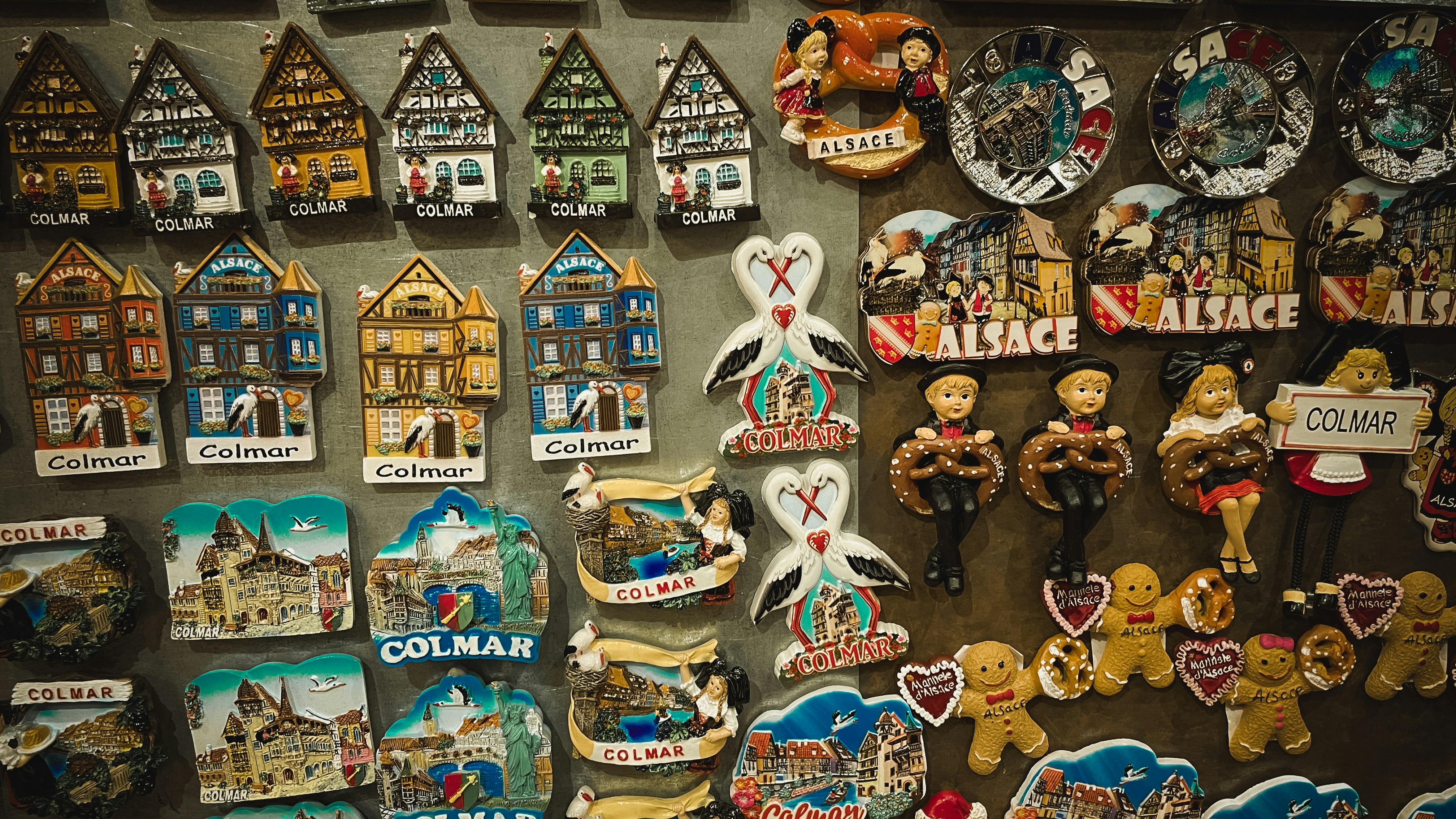 a wall covered in lots of different types of magnets