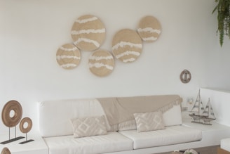 a living room filled with furniture and a white couch