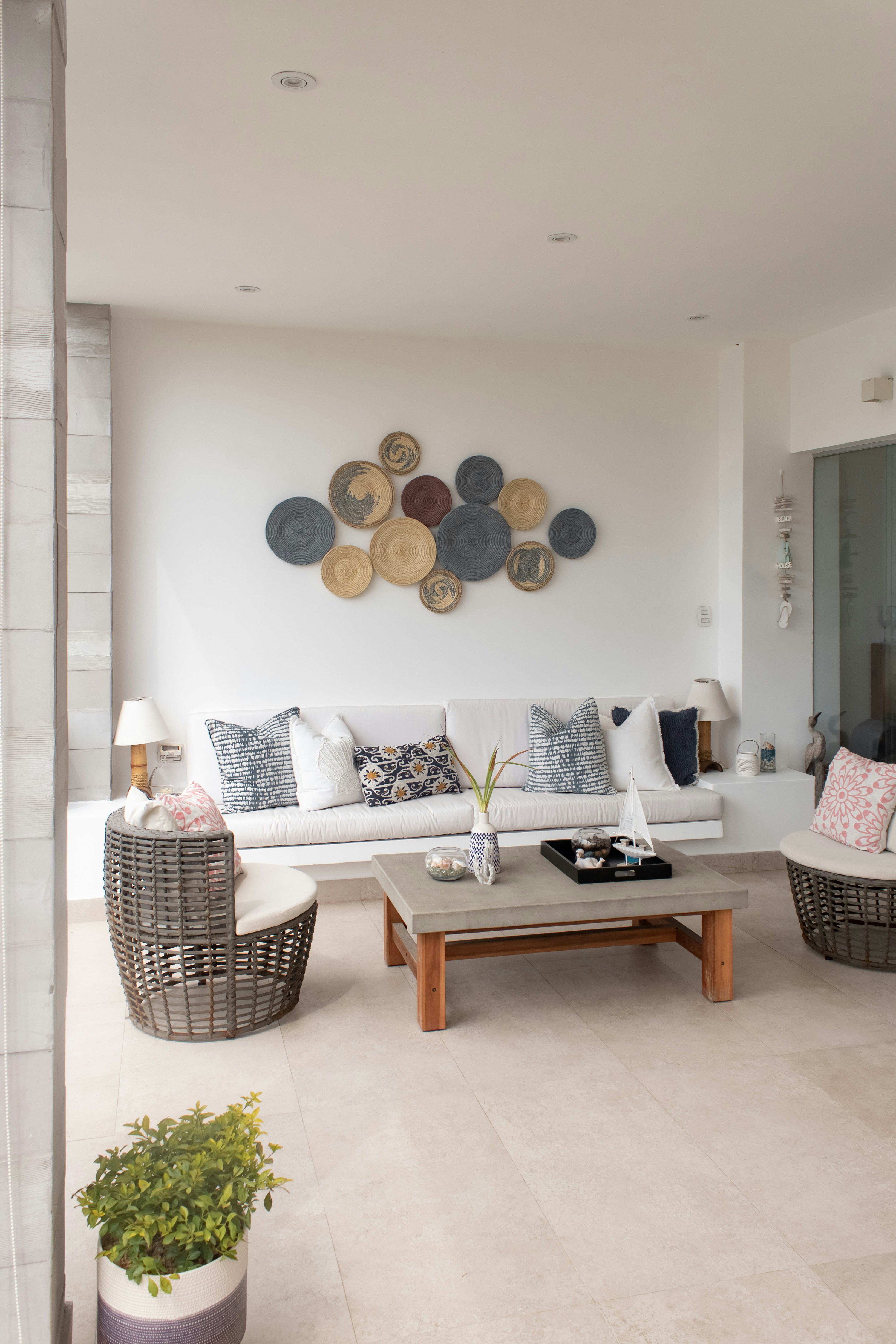 a living room filled with furniture and decor