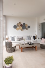 a living room filled with furniture and decor
