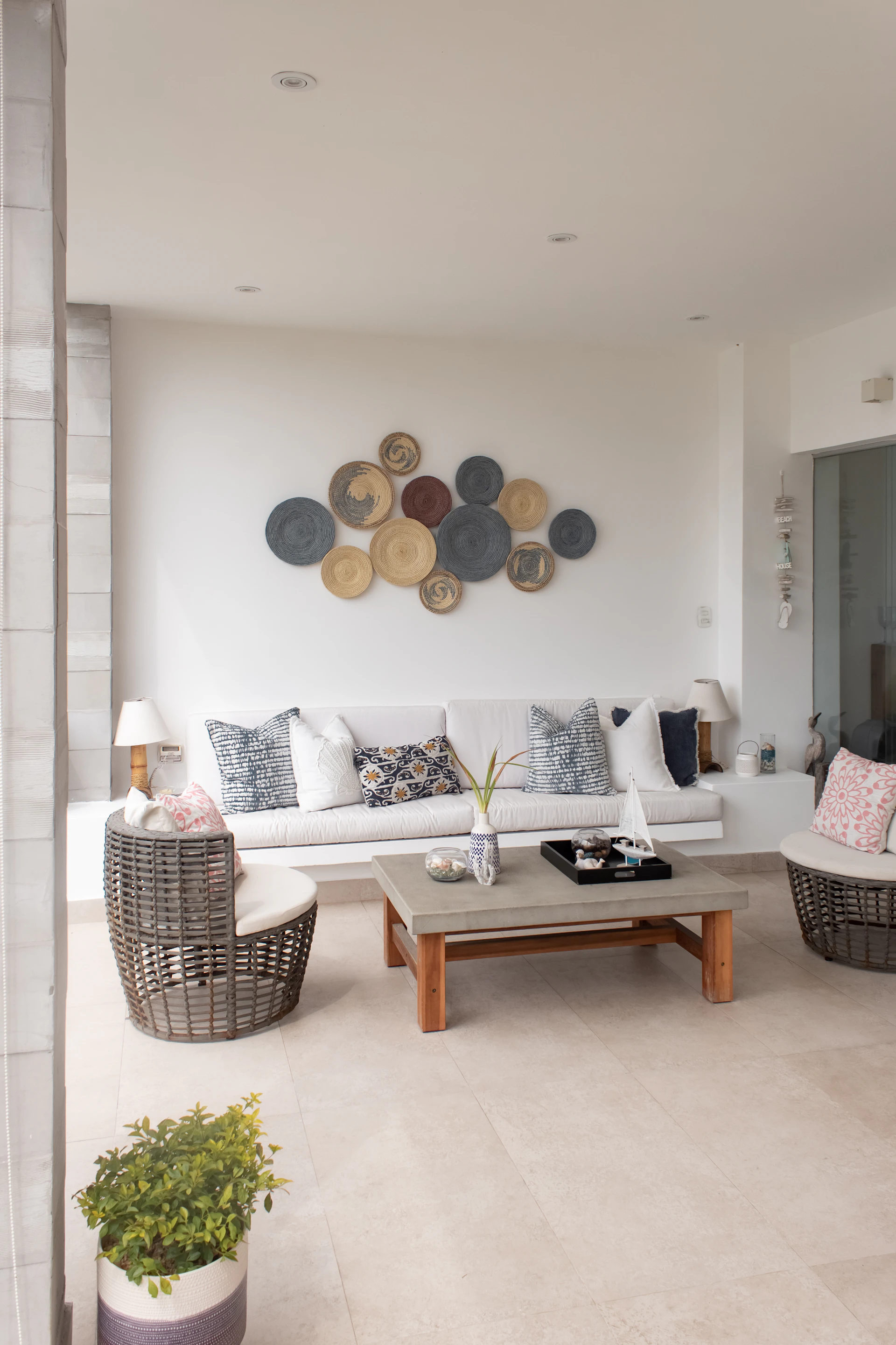 a living room filled with furniture and decor