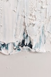 a close up of a piece of white paint