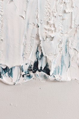 a close up of a piece of white paint