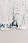 a close up of a piece of white paint