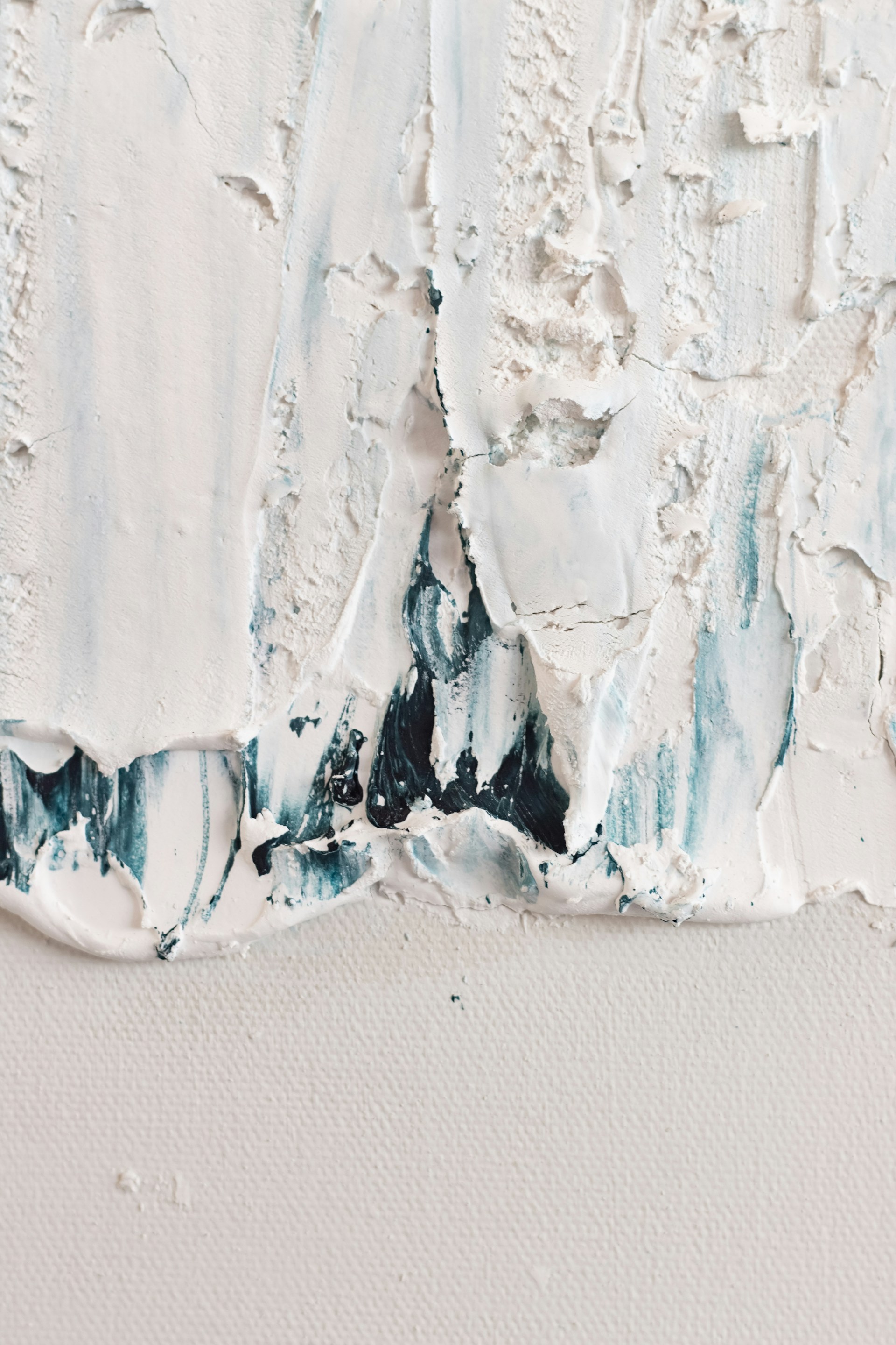 a close up of a piece of white paint