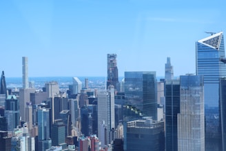 a view of a city from the top of a skyscraper