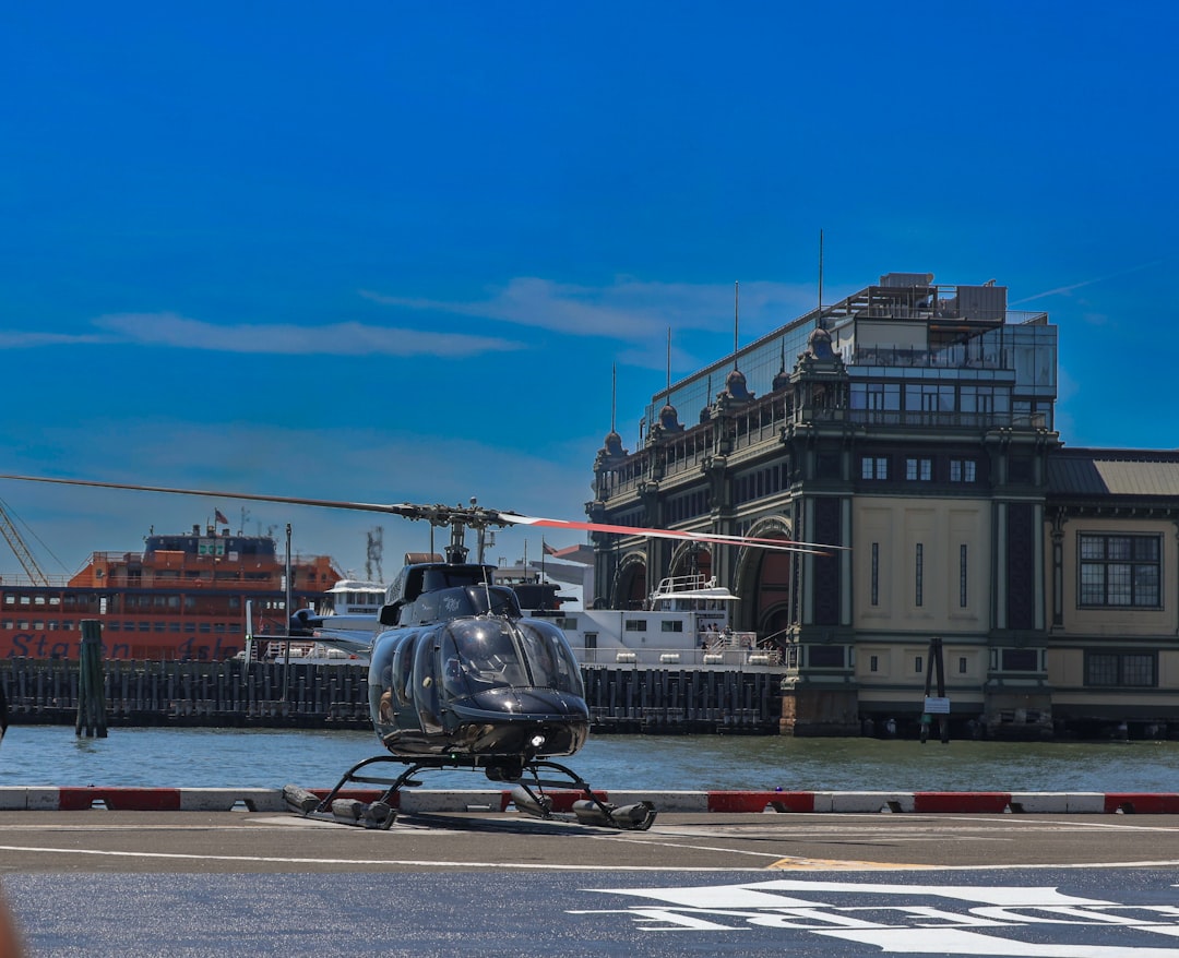 a helicopter is parked on the side of the road, Helicopter Tour