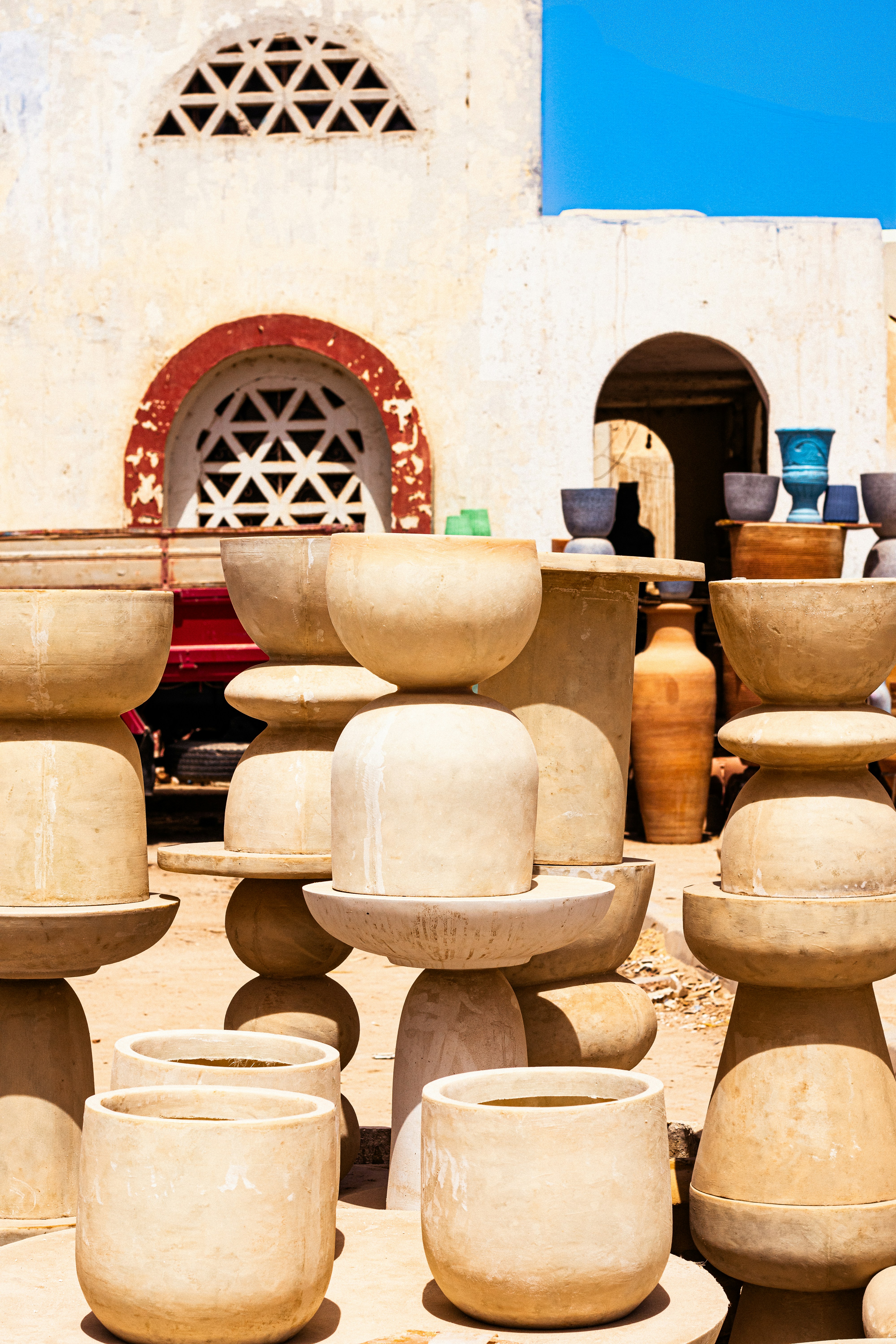 a group of vases stacked on top of each other