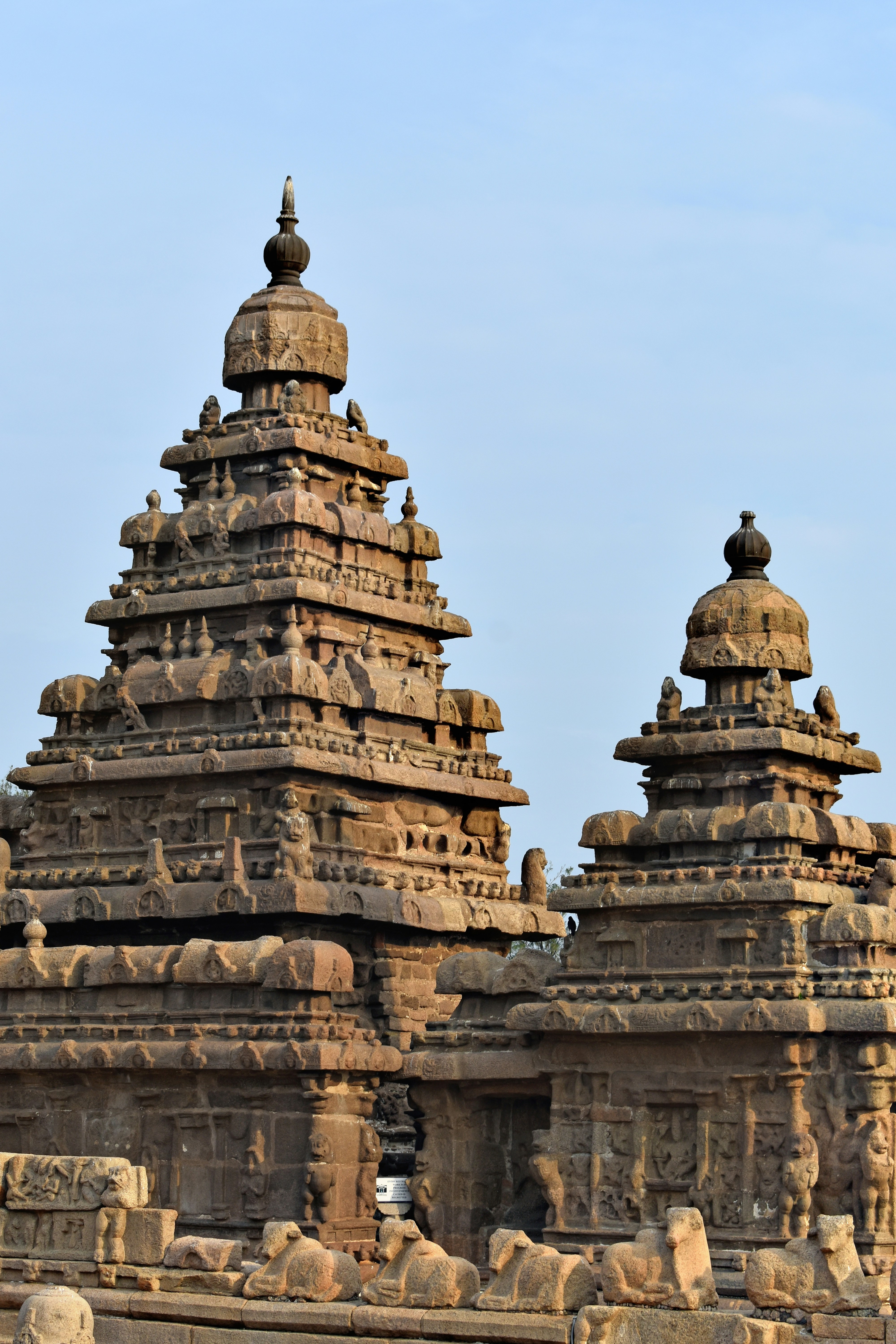 a large stone structure with a clock on top of it