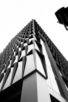 a black and white photo of a tall building