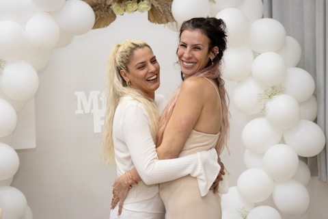 a couple of women standing next to each other