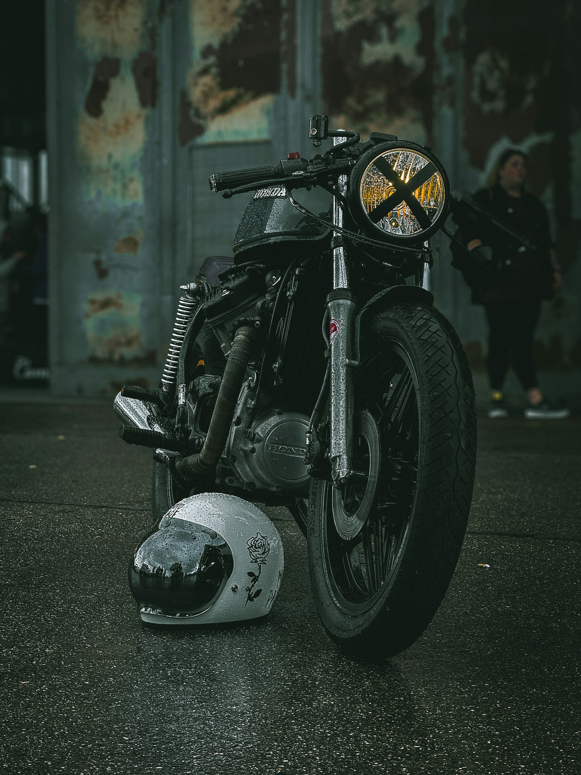 a motorcycle with a helmet on the ground