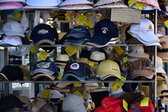 a rack of hats for sale in a store