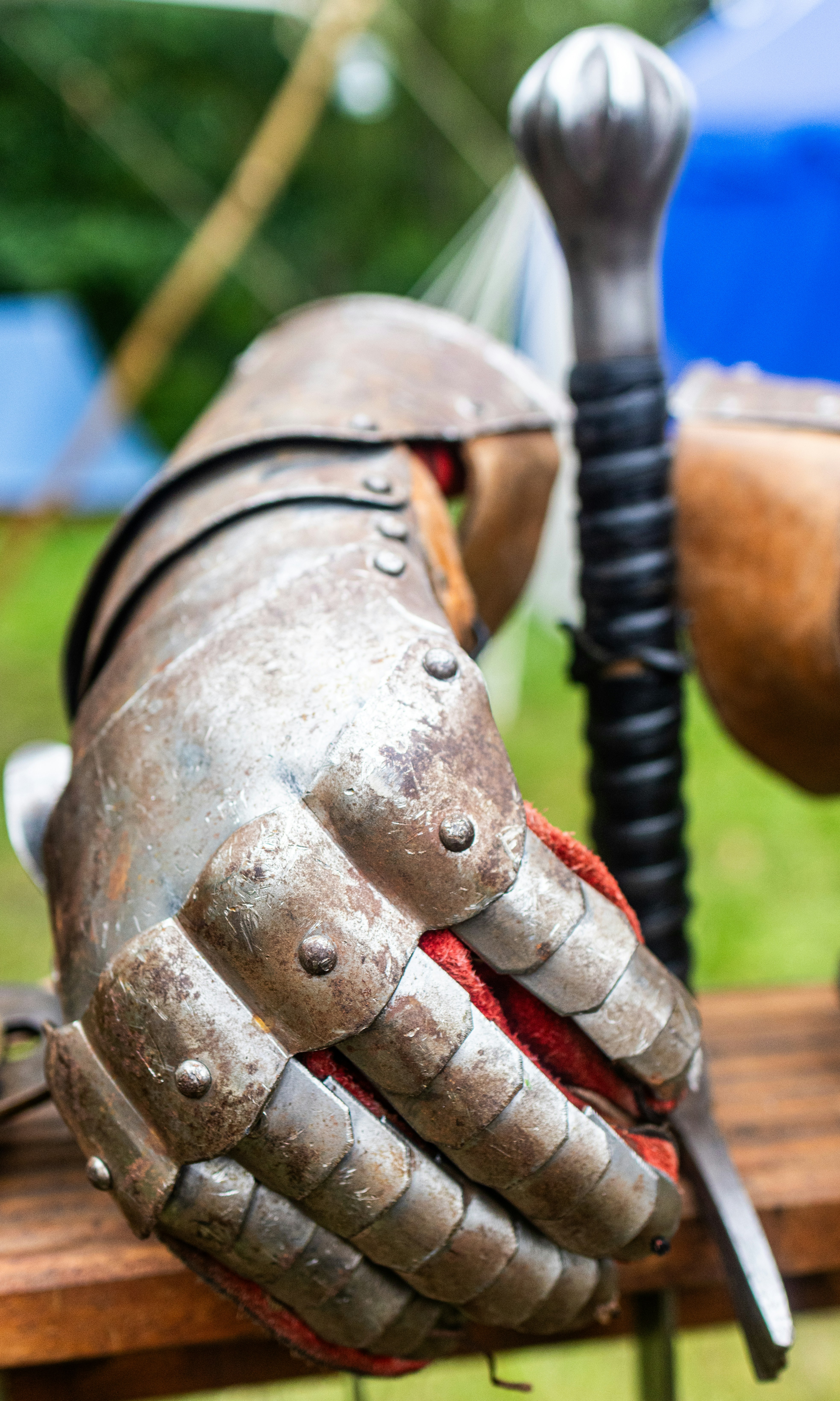 a close up of a pair of gloves on a bench