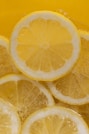 a bunch of lemons that are in a bowl