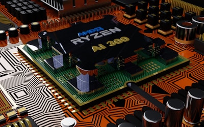 a close up of a computer chip with a logo on it
