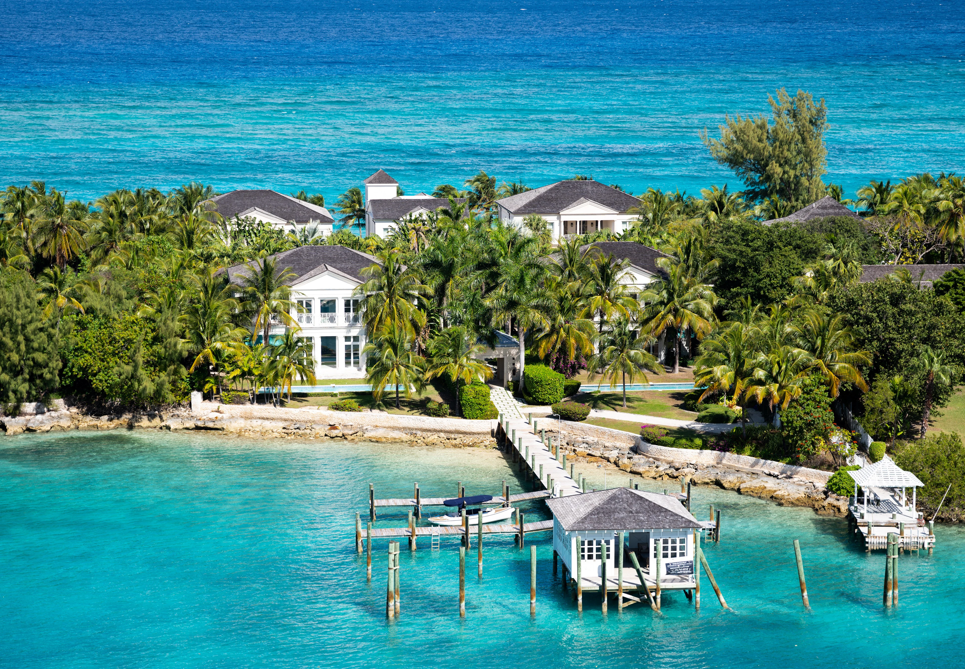 Waterfront villas and a private dock on a Bahamian island