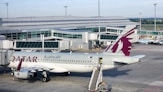 a large jetliner sitting on top of an airport tarmac