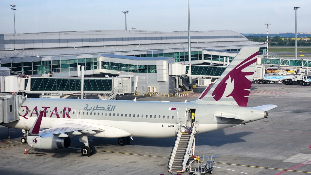 a large jetliner sitting on top of an airport tarmac,