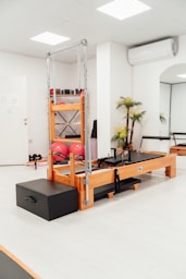 a gym with a treadmill and exercise equipment