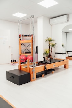 a gym with a treadmill and exercise equipment