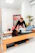 a couple of women are doing exercises in a gym