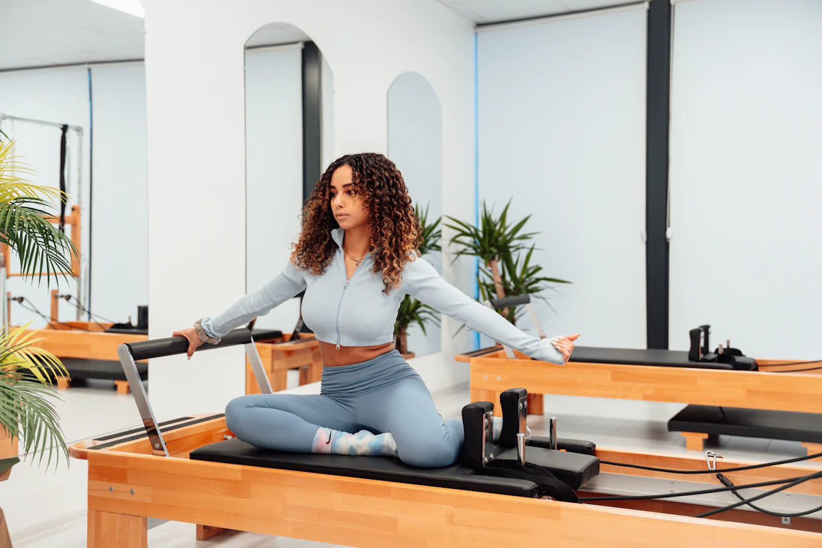 Portrait of a Pilates instructor in a studio