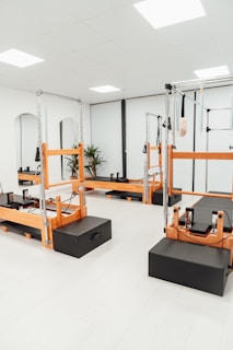 a white room with mirrors and equipment in it