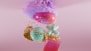 a close up of a toy on a pink background