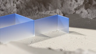 a couple of blue boxes sitting on top of a table