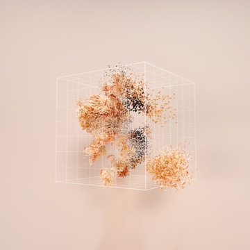 a bunch of different colored objects on a white surface