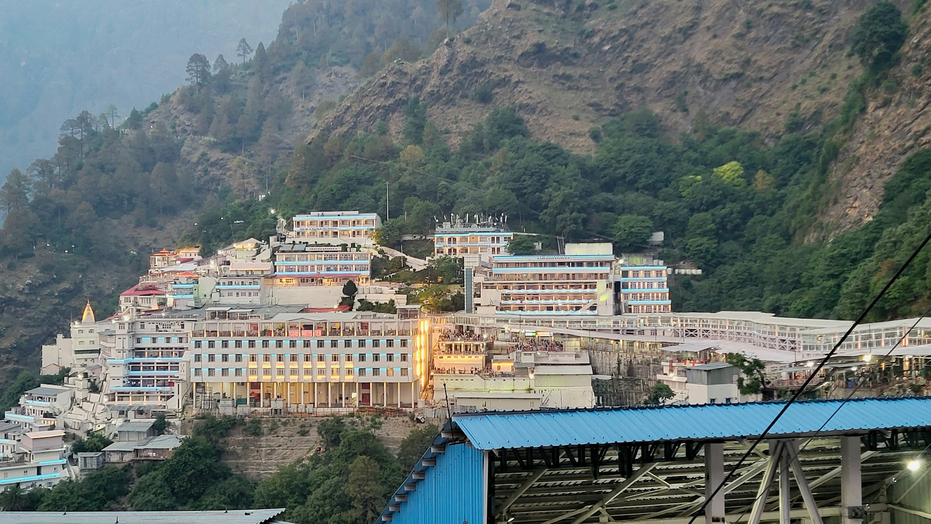 a view of a city with a mountain in the background