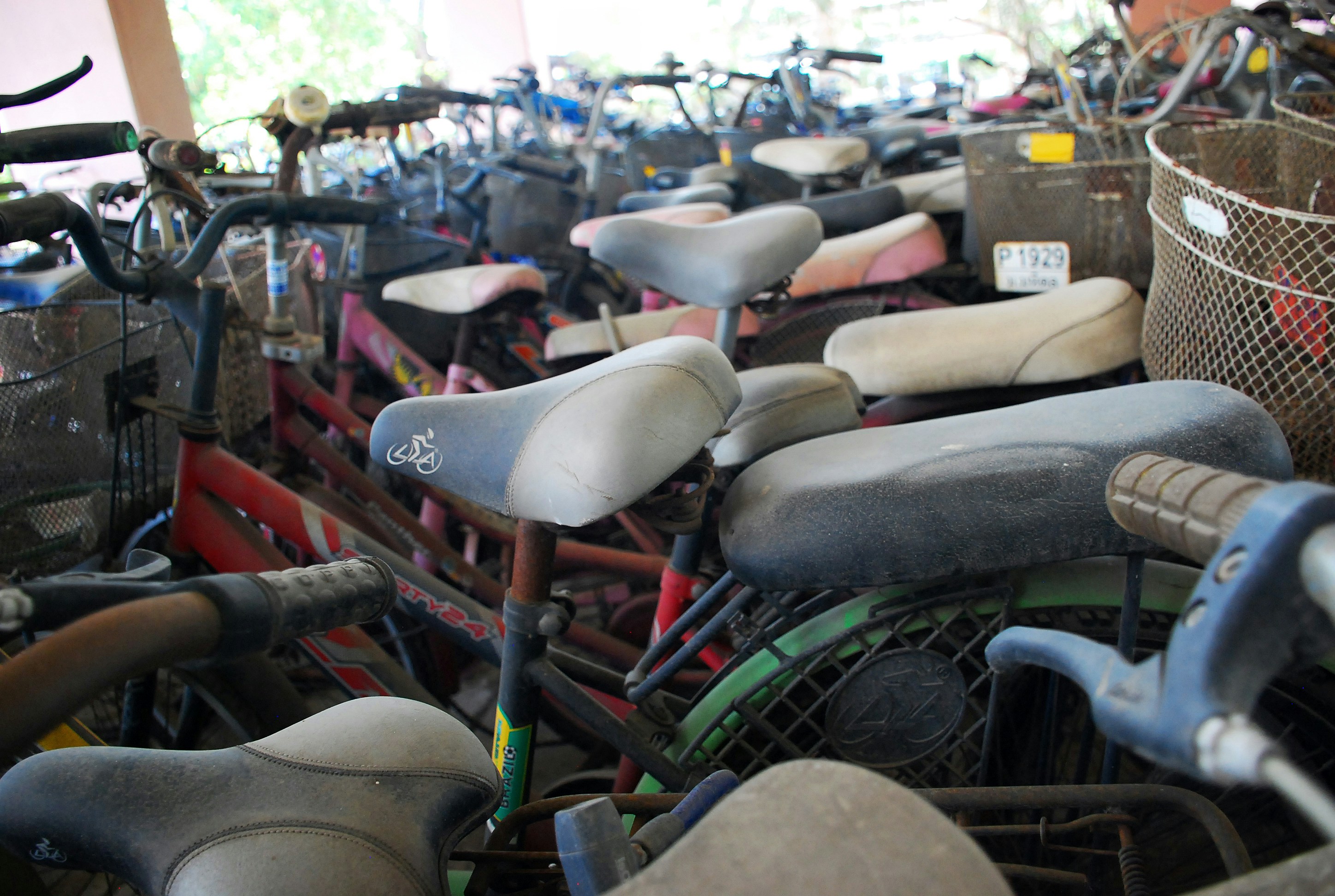 a bunch of bikes that are parked together