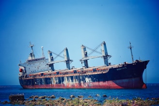 a large ship sitting on top of a body of water