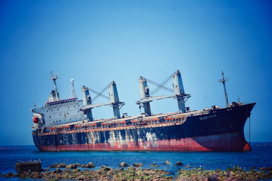 a large ship sitting on top of a body of water