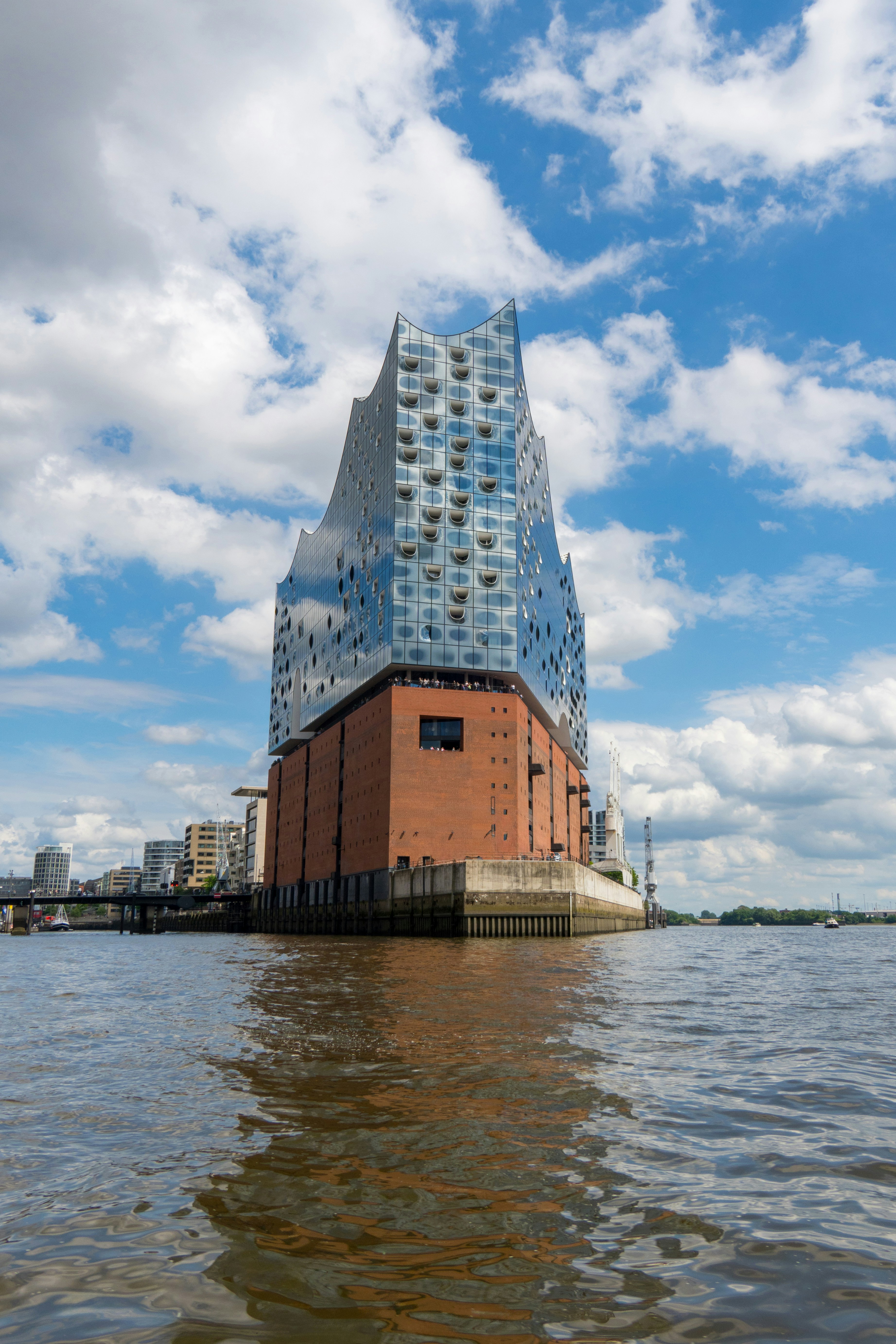 a tall building sitting on top of a body of water