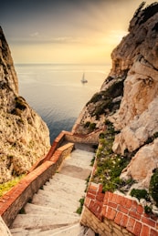 a stairway leading to a boat in the ocean