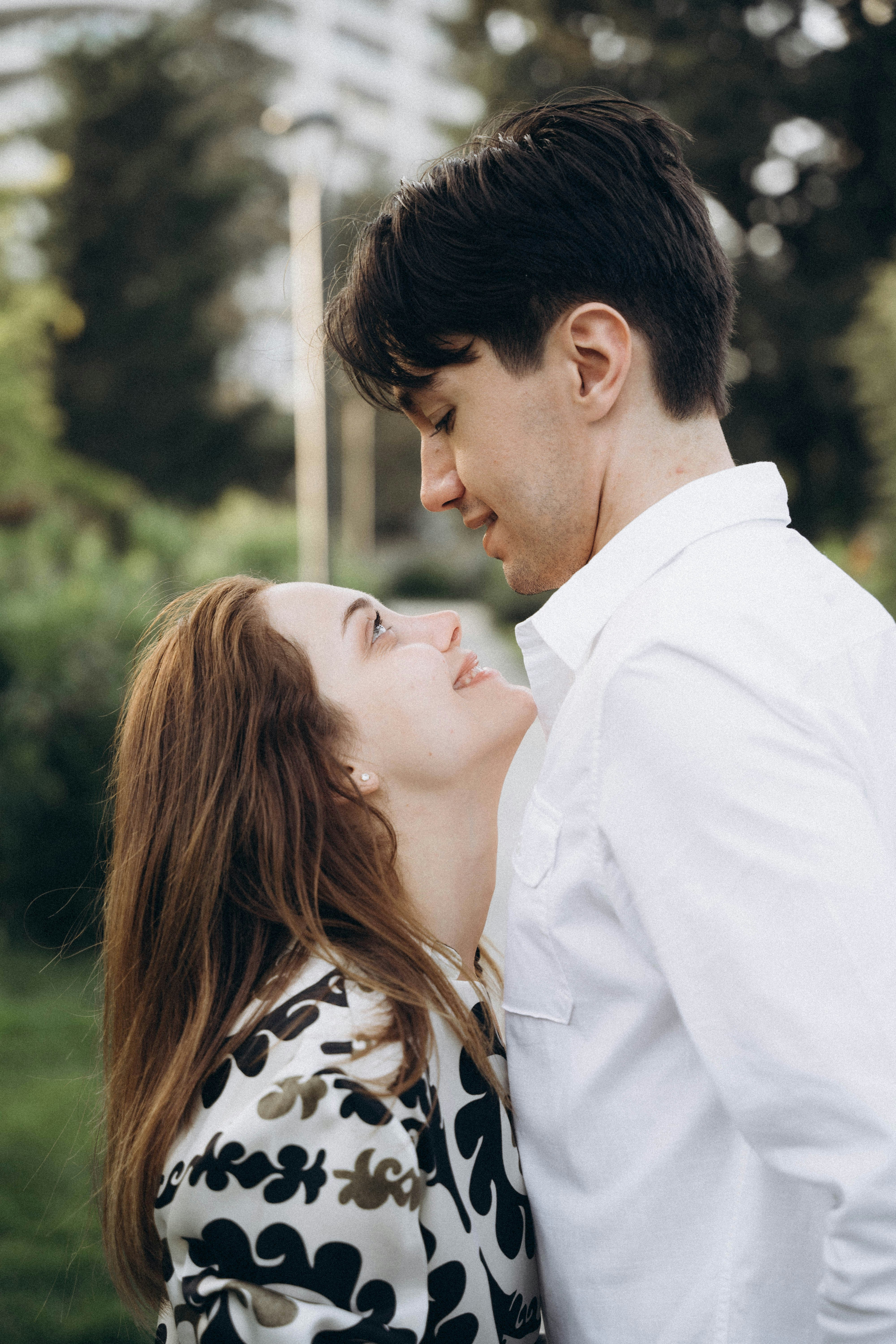 a man and a woman standing next to each other